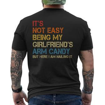 Its Not Easy Being My Girlfriends Arm Candy Am Nailing It Men's Back Print T-shirt | Mazezy