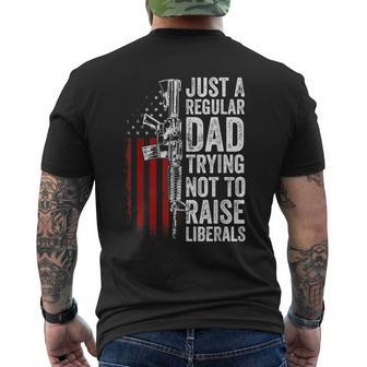 Mens Just A Regular Dad Trying Not To Raise Liberals Fathers Day Men's T-shirt Back Print - Seseable