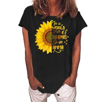 In A World Full Of Grandmas Be An Amma Gift With Sunflower Gift For Womens Women's Loosen Crew Neck Short Sleeve T-Shirt | Mazezy