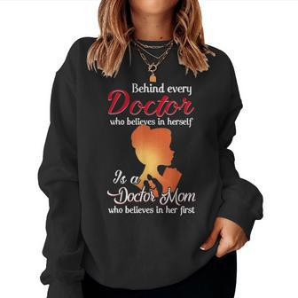 Behind Every Doctor Is A Doctor Mom Who Believe In Her First Women Crewneck Graphic Sweatshirt - Seseable