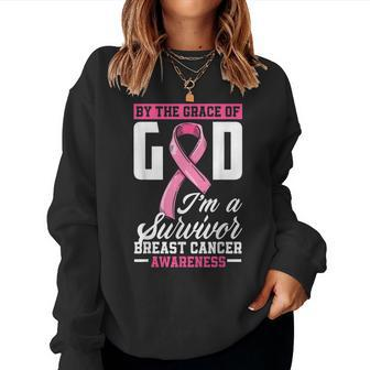 By The Grace God Im A Survivor Breast Cancer Survivor Women Crewneck Graphic Sweatshirt - Seseable