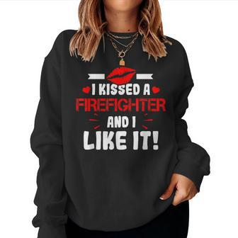 I Kissed A Firefighter And I Like It Wife Girlfriend Gift Women Crewneck Graphic Sweatshirt - Seseable