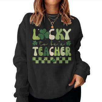 Lucky To Be A Teacher Groovy Retro St Patricks Day Women Sweatshirt | Mazezy