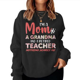 Im A Mom Grandma And A Retired Teacher Nothing Scares Me Sweatshirt | Mazezy