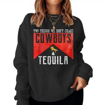 Two Things We Dont Chase Cowboys And Tequila Humor Women Crewneck Graphic Sweatshirt - Seseable