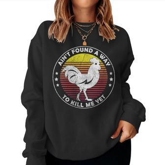Womens Aint Found A Way To Kill Me Yet Vintage Rooster Women Crewneck Graphic Sweatshirt - Seseable