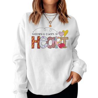 Cute Teacher Teaching Is A Work Of Heart Teachers Day Women Sweatshirt | Mazezy