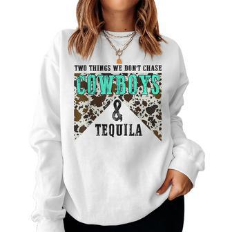 Two Things We Dont Chase Cowboys And Tequila Cowhide Retro Women Sweatshirt | Mazezy