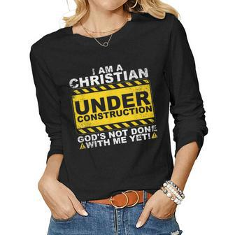 Christian Under Construction Catholic Men Women Women Long Sleeve T-shirt | Mazezy