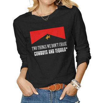 Cowboys And Tequila Rodeo Are Two Things We Dont Chase Women Long Sleeve T-shirt | Mazezy