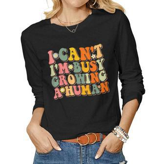 Groovy I Cant Im Busy Growing A Human Retro Pregnant Mom Women Long Sleeve T-shirt | Mazezy