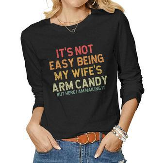 Its Not Easy Being My Wifes Arm Candy But Here I Am Nailin Women Graphic Long Sleeve T-shirt - Seseable
