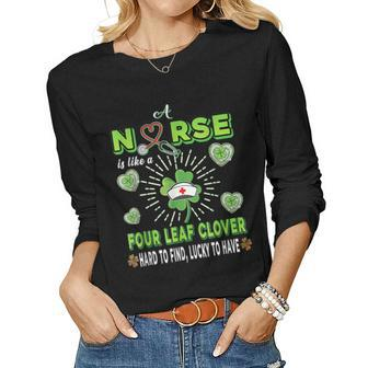 St Patricks Day Scrubs Top Nurse Is Like A Four Leaf Clover Women Graphic Long Sleeve T-shirt - Seseable
