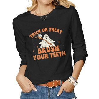 Trick Or Treat Brush Your Th Dental Halloween Ghosh Funny Women Graphic Long Sleeve T-shirt - Thegiftio UK