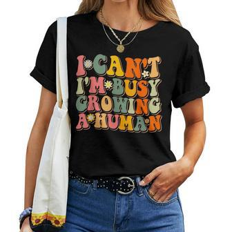 Groovy I Cant Im Busy Growing A Human Retro Pregnant Mom Women T-shirt | Mazezy CA