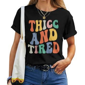 Thicc And Tired Saying Groovy Women Thicc & Tired Women T-shirt | Mazezy