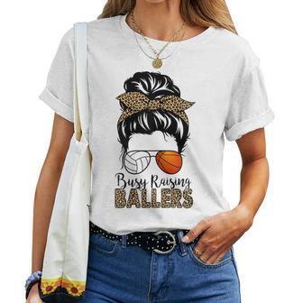 Busy Raising Ballers Basketball And Volleyball Mom Messy Bun Women T-shirt | Mazezy