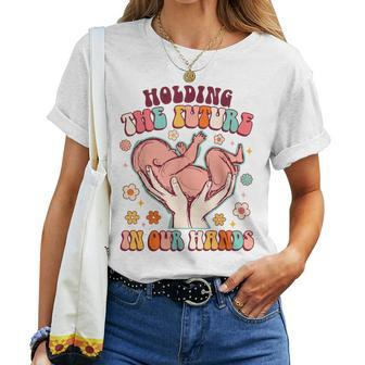 Holding The Future In Our Hands Groovy Doula Midwife L&D Women T-shirt | Mazezy