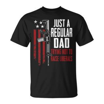 Just A Regular Dad Trying Not To Raise Liberals On Back T-Shirt - Seseable