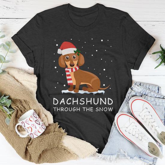 Merry Christmas Dachshund Dog Through The Snow Unisex T Shirt Monsterry