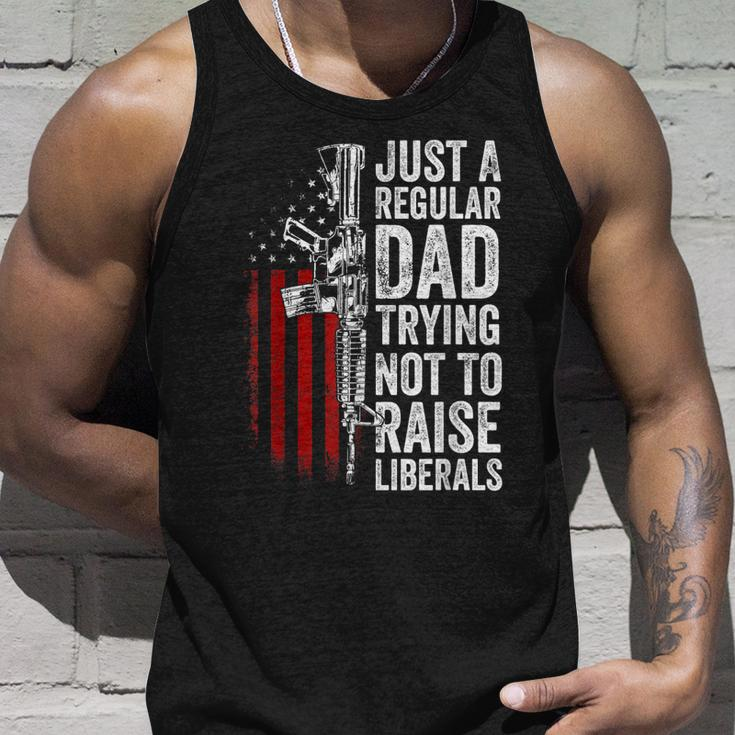 Mens Just A Regular Dad Trying Not To Raise Liberals Fathers Day Unisex Tank Top Gifts for Him