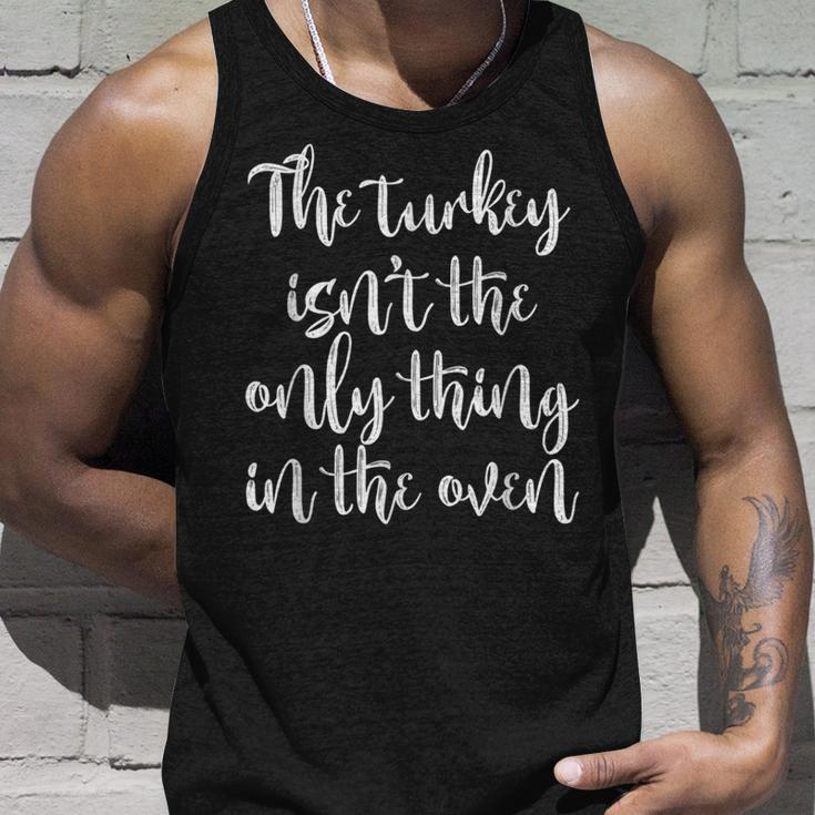 The Turkey Isnt The Only Thing In The Oven Unisex Tank Top Gifts for Him