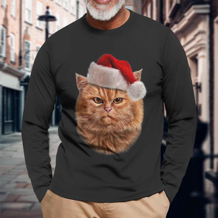 Disgruntle Orange Tabby Cat In Santa Hat Christmas Men Women Long Sleeve T- shirt Graphic Print Unisex