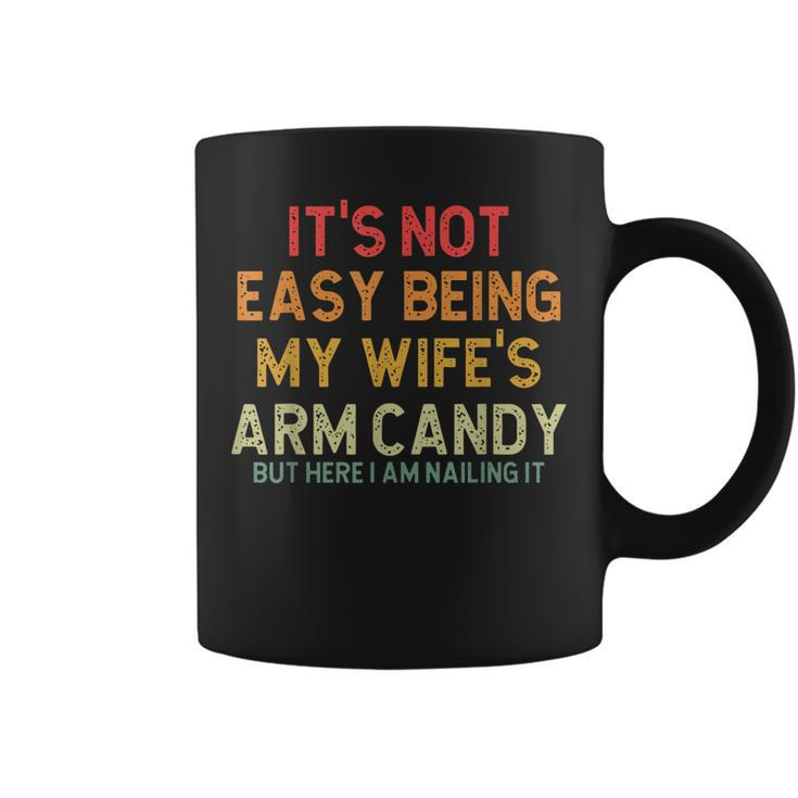 Its Not Easy Being My Wifes Arm Candy But Here I Am Nailin  Coffee Mug