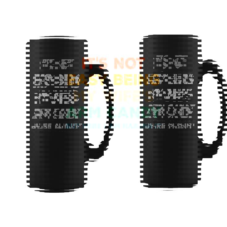 Mens Its Not Easy Being My Wifes Arm Candy But Here I Am  Coffee Mug