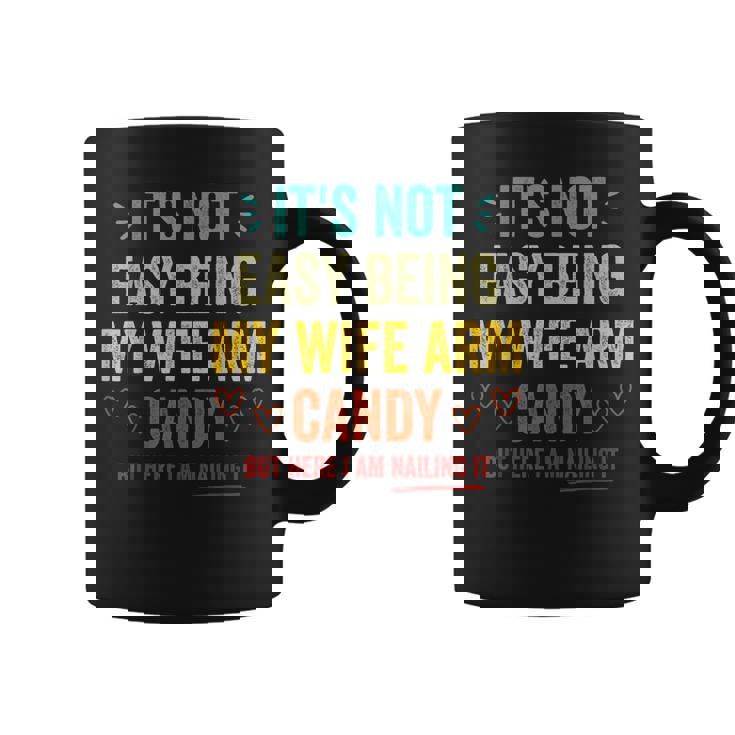 Mens Its Not Easy Being My Wifes Arm Candy But Here I Am  Coffee Mug
