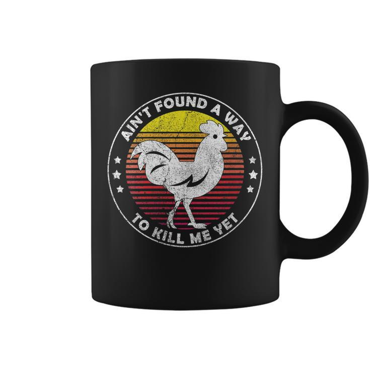 Womens Aint Found A Way To Kill Me Yet Vintage Rooster  Coffee Mug
