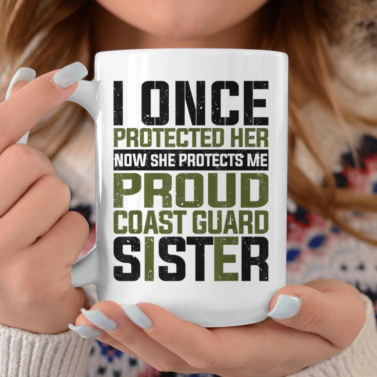 Coast Guard Now She Protects Me Proud Coast Guard Sister Coffee Mug Funny Gifts