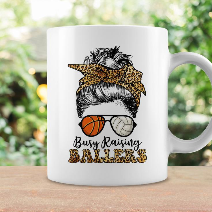 Busy Raising Ballers Basketball And Volleyball Mom Messy Bun Coffee Mug Gifts ideas