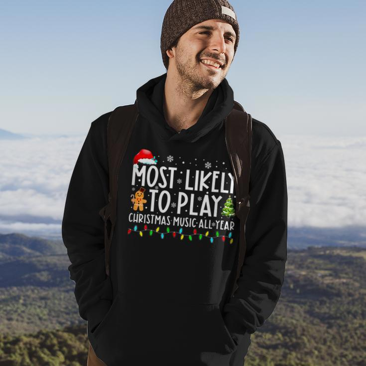 Most Likely To Play Christmas Music All Year Funny Xmas Men Hoodie Graphic Print Hooded Sweatshirt Lifestyle