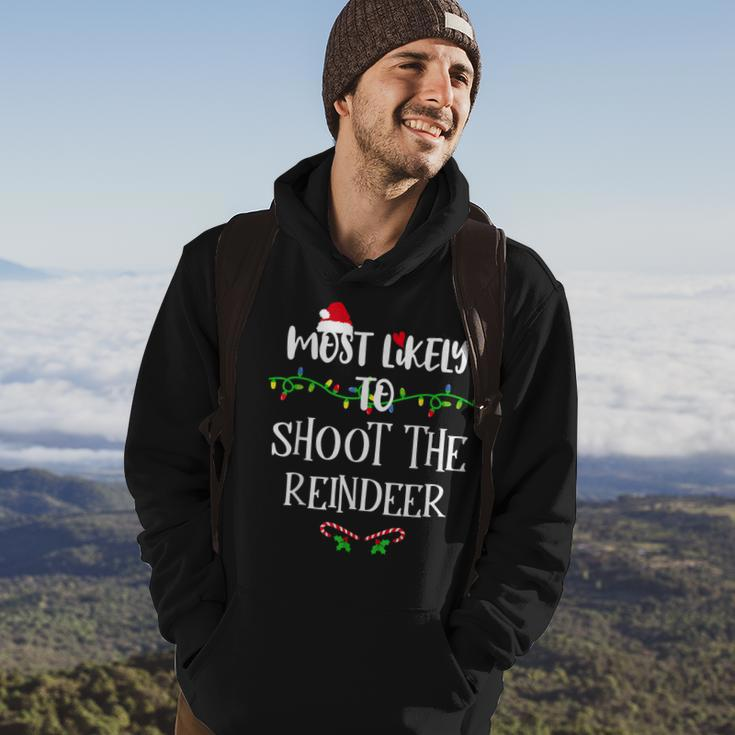 Most Likely To Shoot The Reindeer Christmas Family Group Men Hoodie Graphic Print Hooded Sweatshirt Lifestyle
