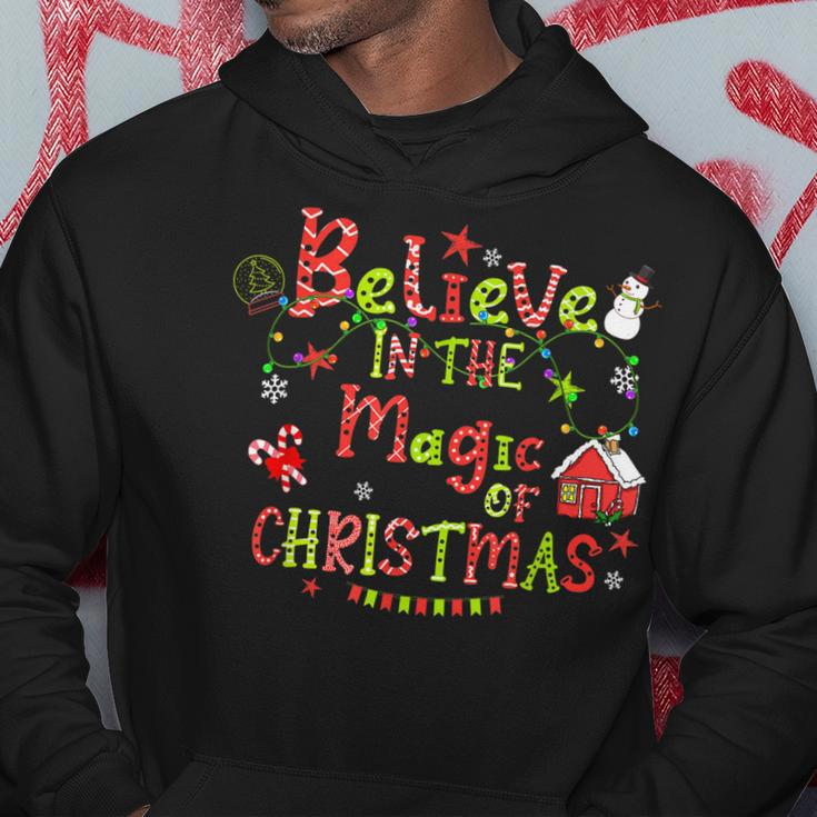 Believe In The Magic Of Christmas Santa Snowman Candy Cane Men Hoodie Graphic Print Hooded Sweatshirt Funny Gifts