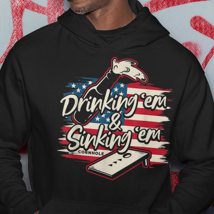 Cornhole For Men Drinking Em Sinking Em 4Th Of July Hoodie Unique Gifts