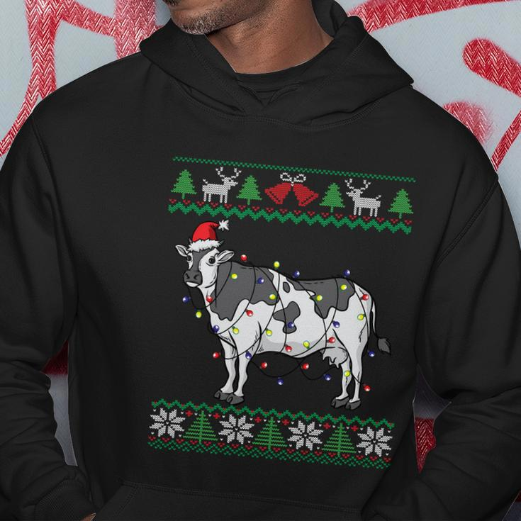 Cow Santa Claus And Lights Funny Dairy Farmer Ugly Christmas Gift Hoodie Unique Gifts