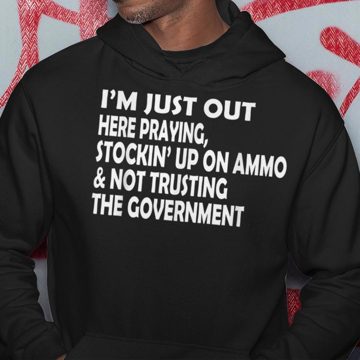 Im Just Out Here Praying Stockin Up On Ammo Not Trusting Hoodie Unique Gifts