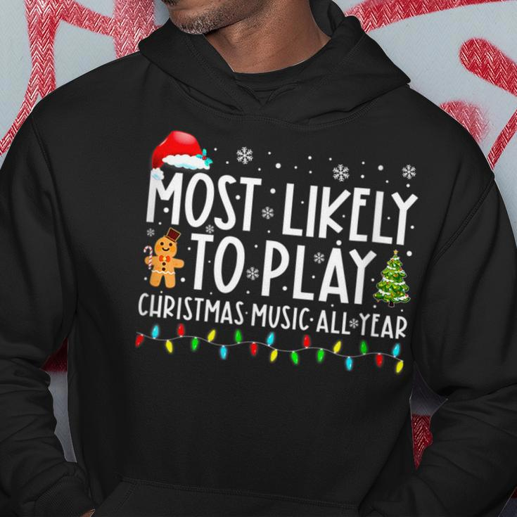 Most Likely To Play Christmas Music All Year Funny Xmas Men Hoodie Graphic Print Hooded Sweatshirt Funny Gifts
