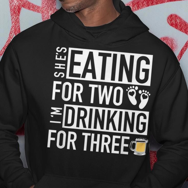 Shes Eating For Two Im Drinking For Three - Dad To Be Hoodie Personalized Gifts