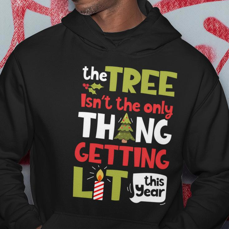 The Tree Isnt The Only Thing Getting Lit This Year Xmas Hoodie Unique Gifts