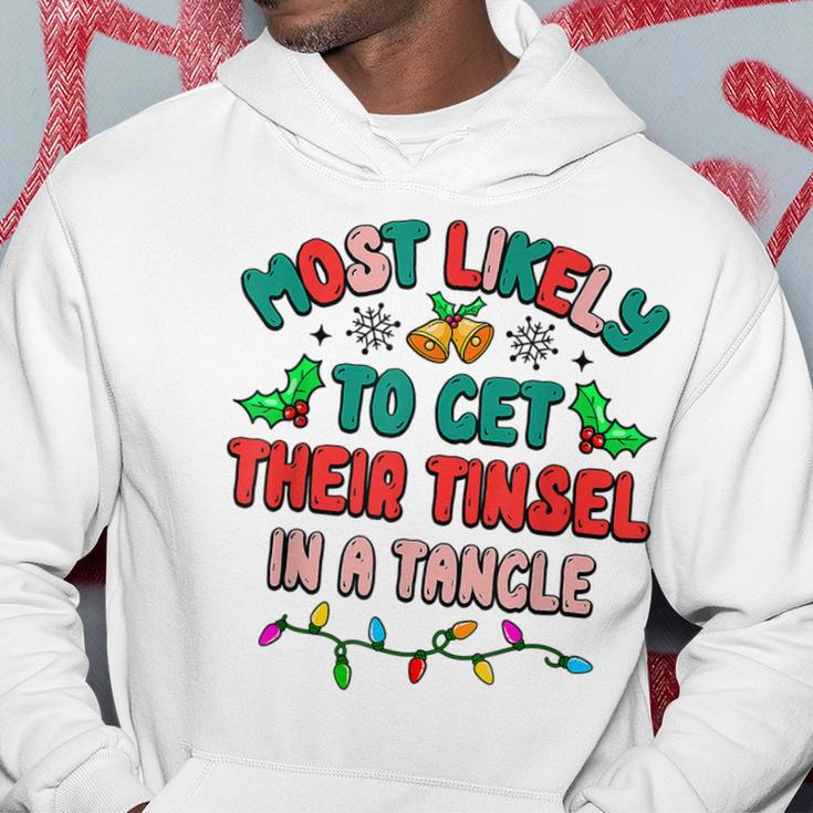 Most Likely To Get Their Tinsel In A Tangle Christmas Family Men Hoodie Graphic Print Hooded Sweatshirt Funny Gifts