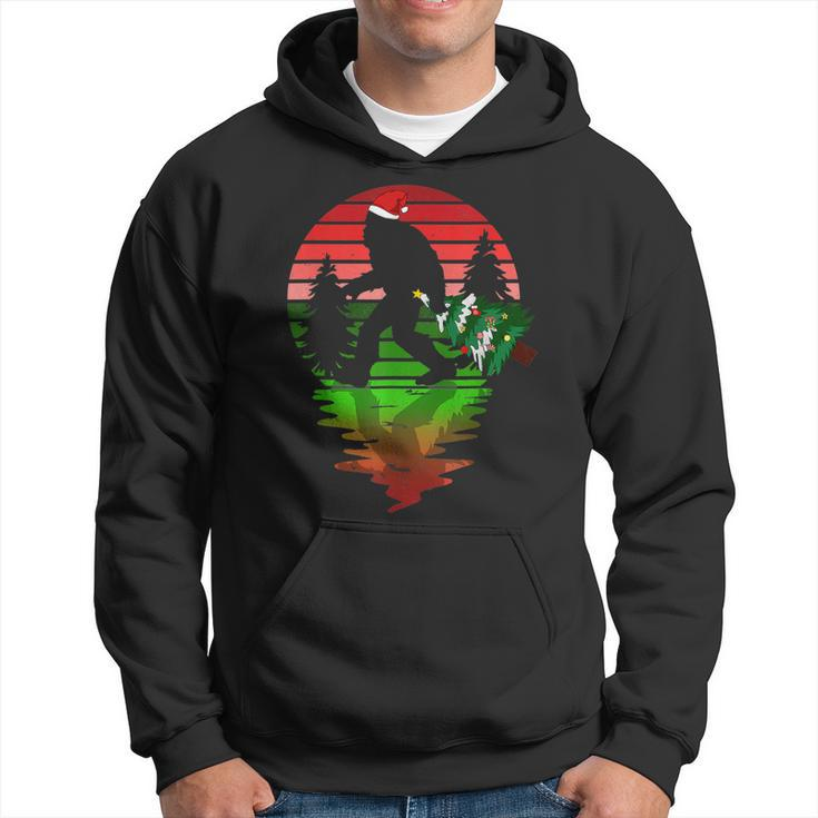 Christmas Bigfoot Carrying Xmas Tree Sasquatch Believer Pjs  Men Hoodie Graphic Print Hooded Sweatshirt