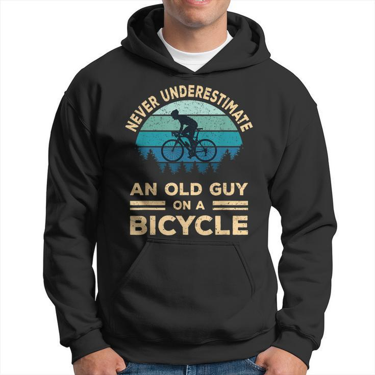Never Underestimate An Old Guy On A Bicycle Funny Biker Dad  Hoodie