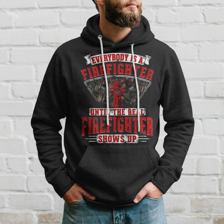 Everybody Is A Firefighter Until The Real Firefighter Shows Hoodie Gifts for Him