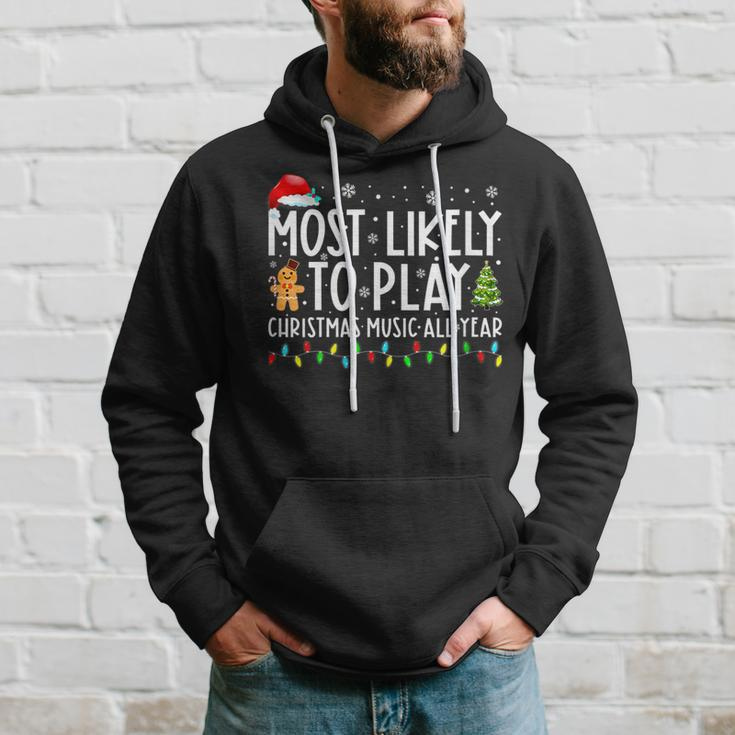 Most Likely To Play Christmas Music All Year Funny Xmas Men Hoodie Graphic Print Hooded Sweatshirt Gifts for Him
