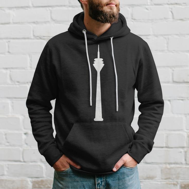 Schwarzes Hoodie mit Weißem Turmdruck Motiv, Modisches Stadtdesign Tee Geschenke für Ihn