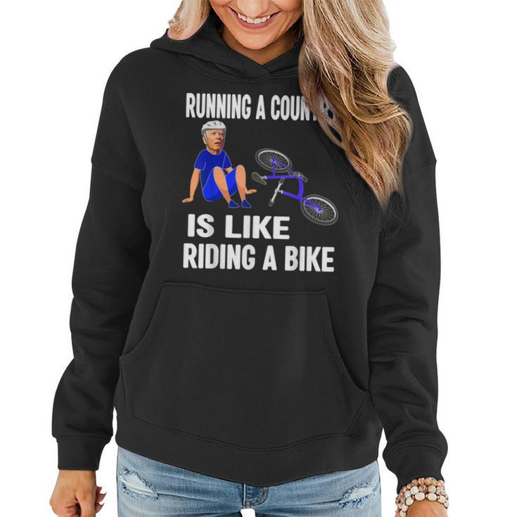 Biden Falls Off Bike Joe Biden Falling Off His Bicycle Funny Women Hoodie Graphic Print Hooded Sweatshirt