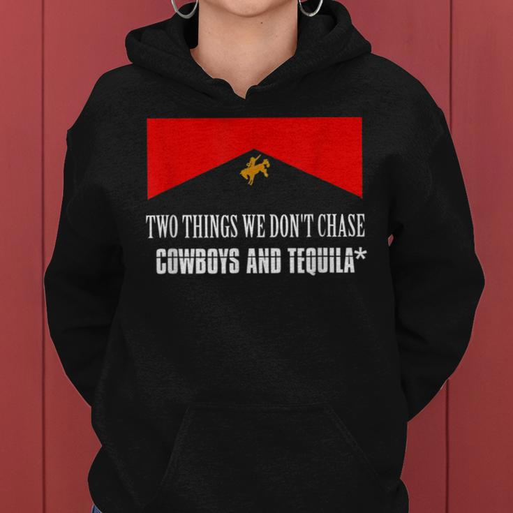 Cowboys And Tequila Rodeo Are Two Things We Dont Chase Women Hoodie